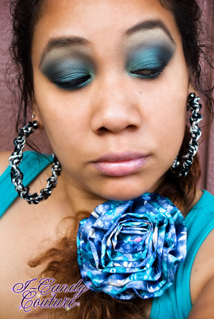 Using ICC's Pressed Mineral Eye Shadow in Silk Sheets, ICC's Pigment in New Moon, ICC's Quads in Chocolate Kisses and Green Apple. ICC Gel Eye liner Duo in Black Out and Cocoa Nut Lipgloss over Revlon lip butter in Cupcake.

Earrings are also by I-Candy Couture.