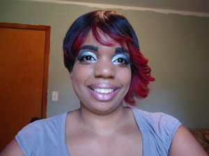 I used a teal and a charcoal eye shadow for the eyes. I have on my new favorite foundation and blush.