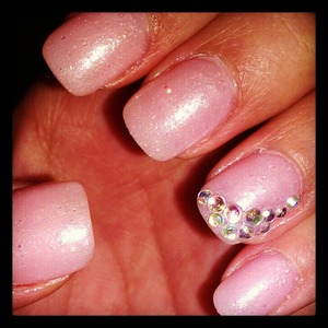 Pink glitter nail polish with little diamond accents! <3