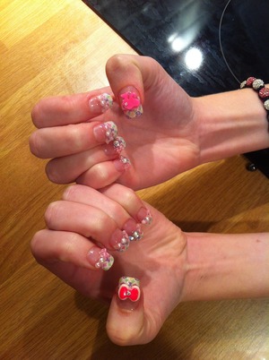 Client from yesterday picked LV designer tips with pearls and bows with a 3d bow and barbie head. Acrylics. 