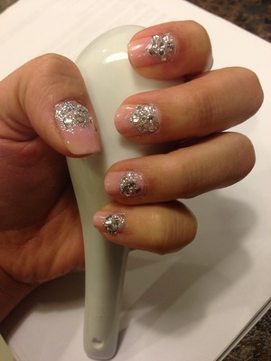 I use a opi pink and made silver triangle the put all type of Crystal.  