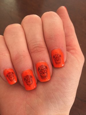 Pigmented gel manicure with sugar skull decals (from YRNAILS).
