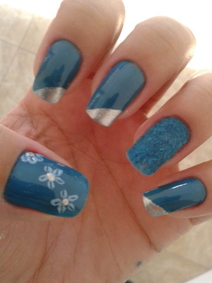 Flowers blue nails.