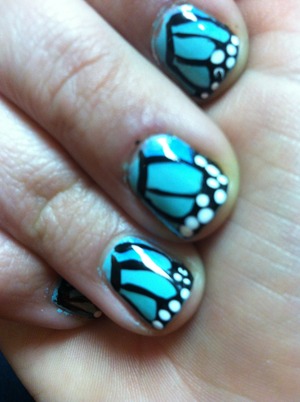 Beautiful butterfly wing nails. Always get plenty of complements when I wear this!