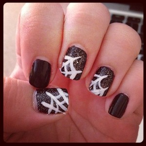 Spiderwebs on my nails with some glitter too of course :)