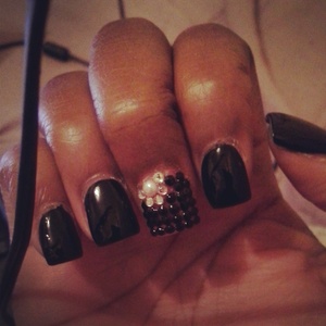 black rhinestone middle finger, black polish