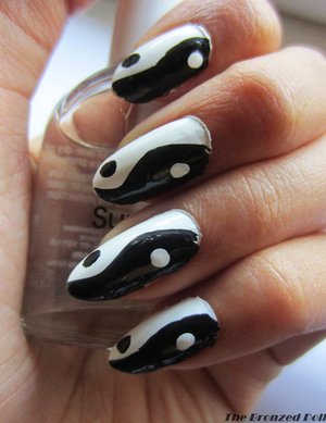my first time trying out yin yang nail design. if you want to know how i achieved this look check out my blog: thebronzeddoll.blogspot.com
