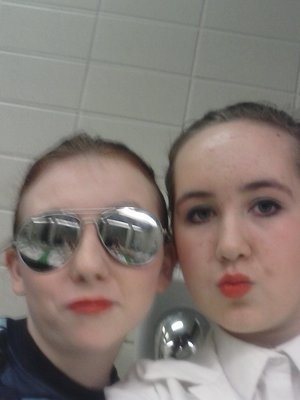 Me and a friend at a dance competition me with the bright red lips what do you think of it?