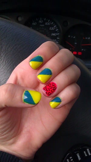 Natural nails with 80's inspired polish done with leopard and tape techniques
Maybelline Color Show - Shocking Seas 
Love & Beauty by Forever 21 - Electric Yellow 
The bright pink was a miniature unmarked bottle i probably got at Sally Beauty Supply 
Seche Vite - Dry Fast Top Coat 	