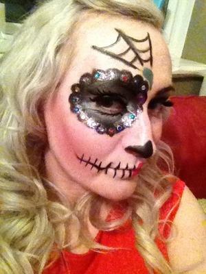 Look created for a Halloween performance. Pin up / sugar skull half face