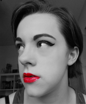 This is a work I did that includes all the basics- full eyebrows, red lips, and winged eyeliner. I just thought that the red lips especially stood out in black and white :)