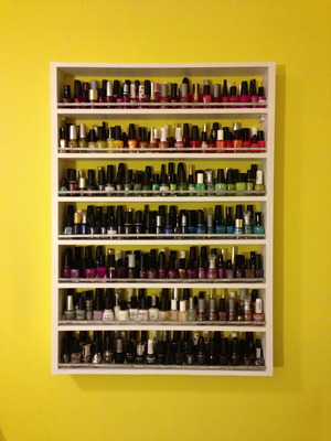 My dad and I made this. Check out my blog post on it.
http://spooks-vanity.blogspot.com/2013/01/amazing-nail-polish-shelf-nail-polish.html